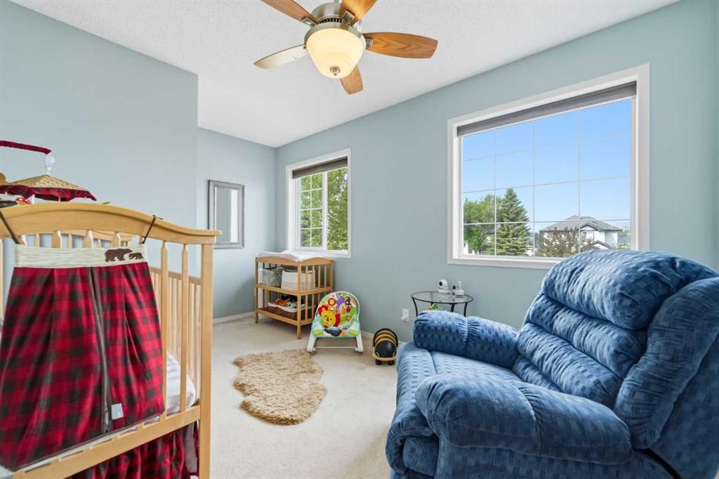 46 Somerside Place Sw, Calgary, AB - Indoor Photo Showing Bedroom