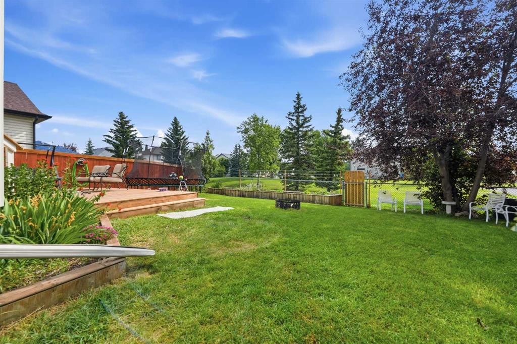 46 Somerside Place Sw, Calgary, AB - Outdoor With Backyard