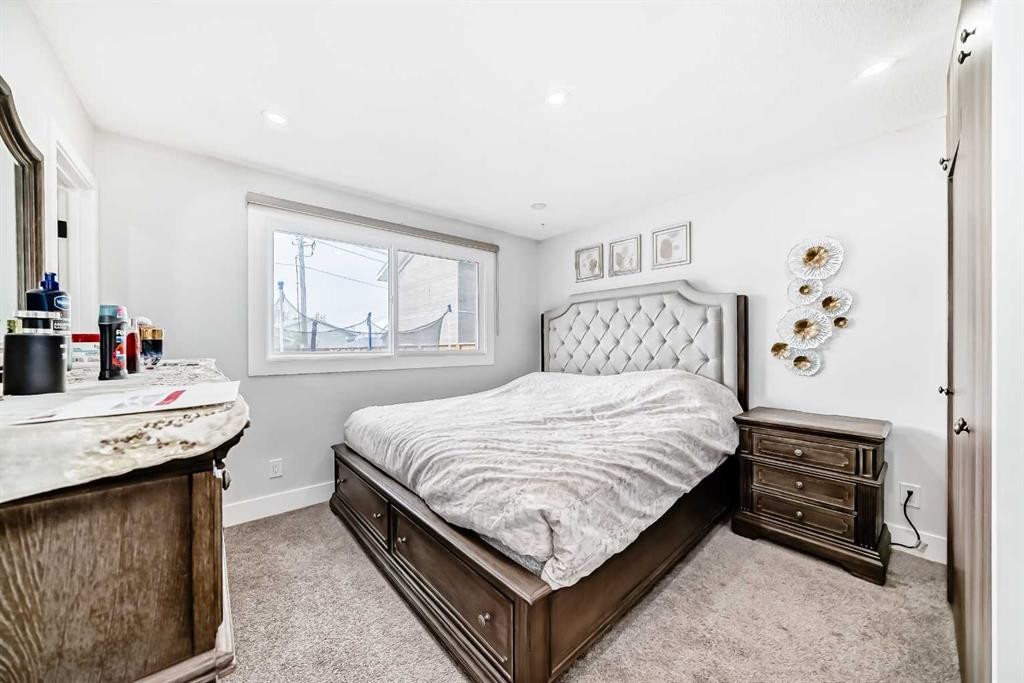 12 Rundleson Way Ne, Calgary, AB - Indoor Photo Showing Bedroom