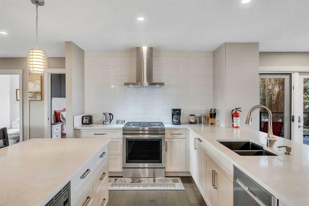 760 West Chestermere Drive, Chestermere, AB - Indoor Photo Showing Kitchen With Double Sink With Upgraded Kitchen