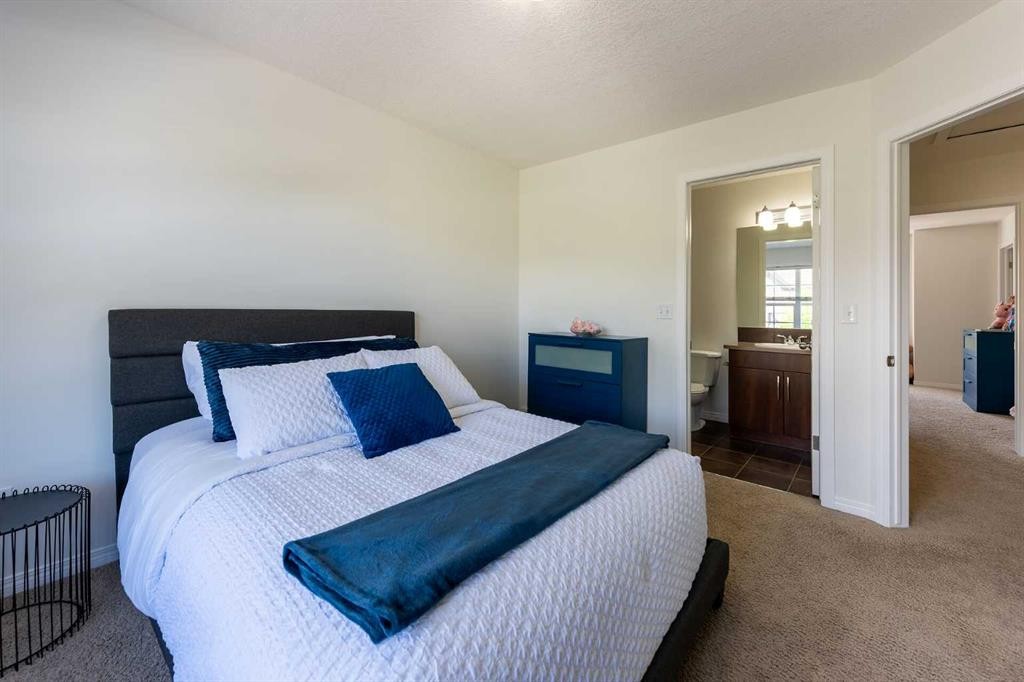 38 Cranford Drive Se, Calgary, AB - Indoor Photo Showing Bedroom