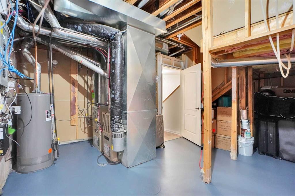 6 Strathridge Way Sw, Calgary, AB - Indoor Photo Showing Basement