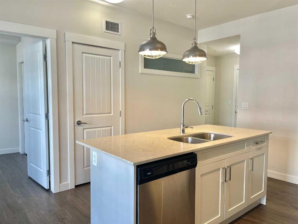 302-100 Auburn Meadows Common Se, Calgary, AB - Indoor Photo Showing Kitchen With Double Sink