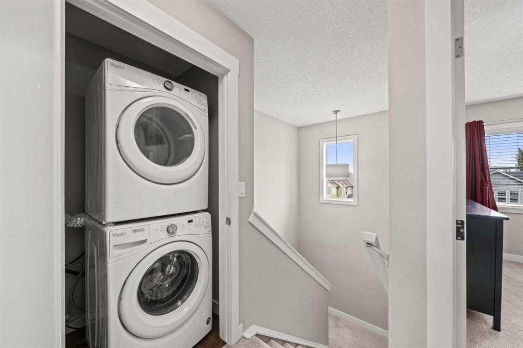 536 Cranford Drive Se, Calgary, AB - Indoor Photo Showing Laundry Room