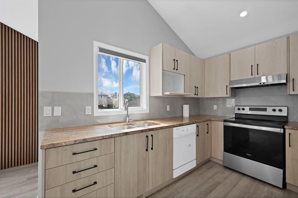 288 Saddlemead Road Ne, Calgary, AB - Indoor Photo Showing Kitchen With Double Sink