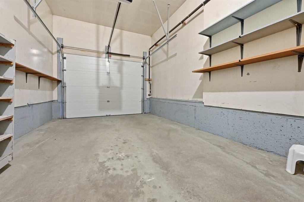 60 Rundlelawn Green Ne, Calgary, AB - Indoor Photo Showing Garage