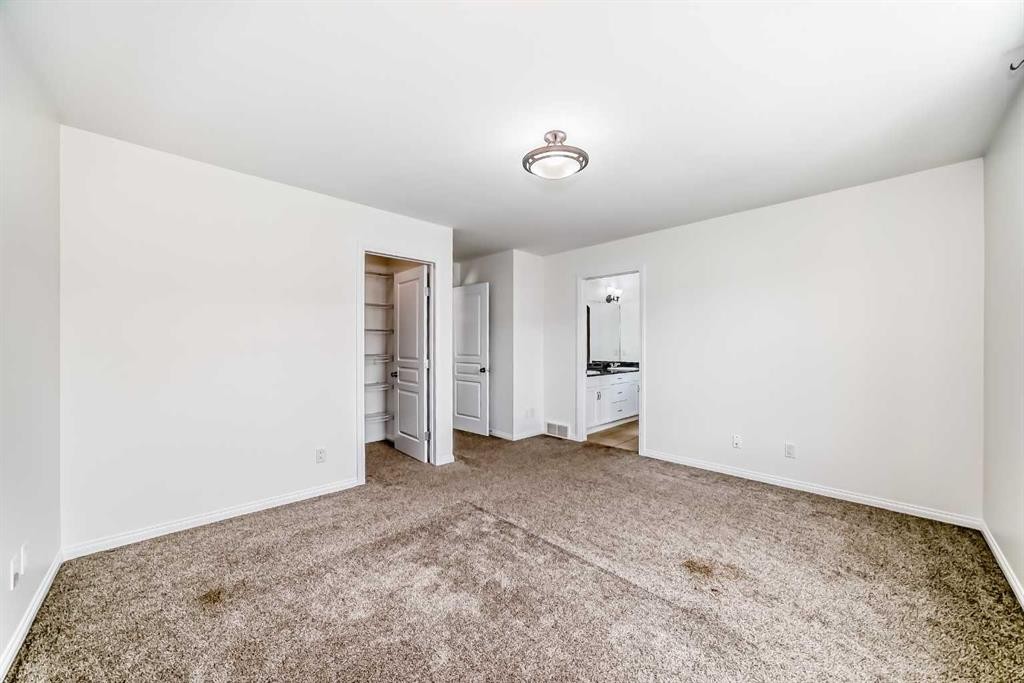 27 Aspen Hills Close Sw, Calgary, AB - Indoor Photo Showing Other Room