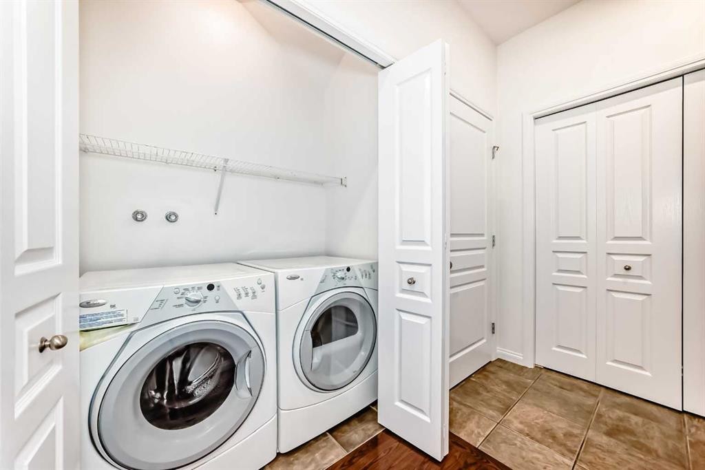 27 Aspen Hills Close Sw, Calgary, AB - Indoor Photo Showing Laundry Room