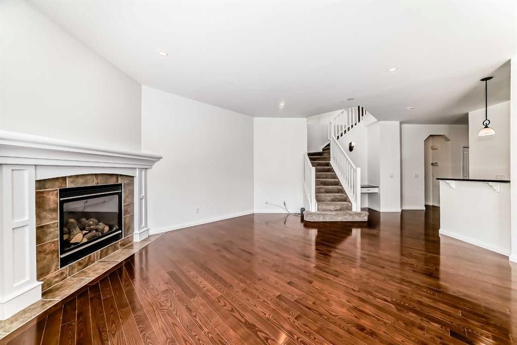 27 Aspen Hills Close Sw, Calgary, AB - Indoor Photo Showing Living Room With Fireplace