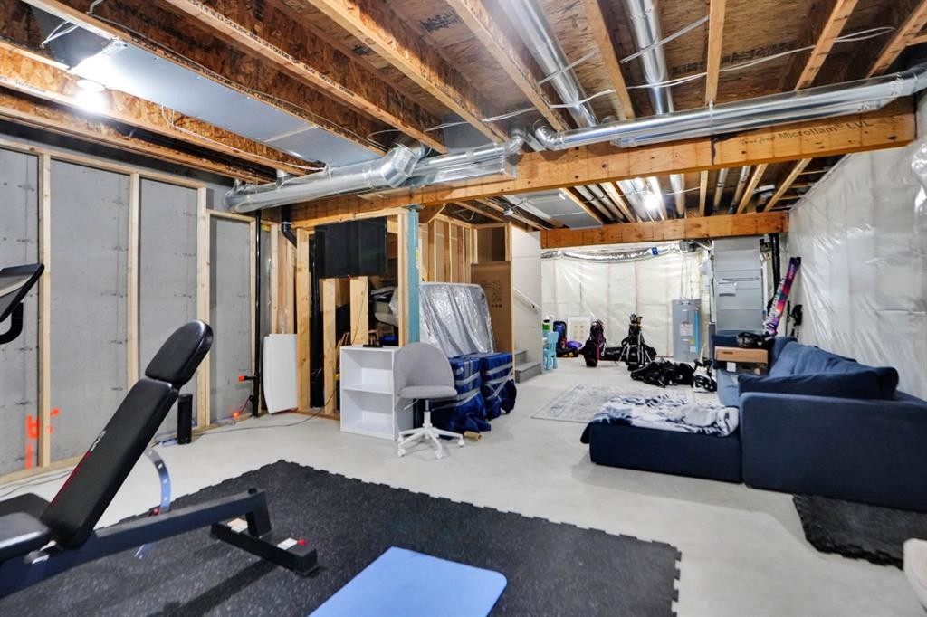 112 Langwell Common Se, Airdrie, AB - Indoor Photo Showing Basement