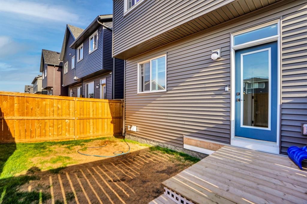 112 Langwell Common Se, Airdrie, AB - Outdoor With Deck Patio Veranda With Exterior