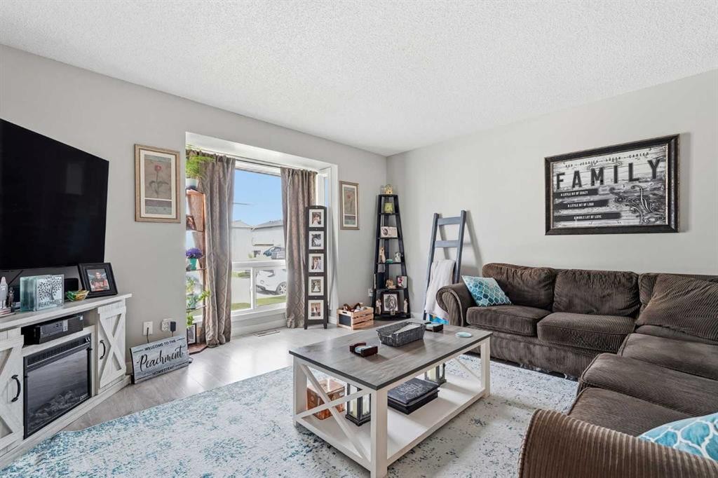 51 Aberdare Way Ne, Calgary, AB - Indoor Photo Showing Living Room