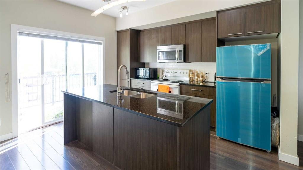 347 Taralake Way Ne, Calgary, AB - Indoor Photo Showing Kitchen With Double Sink