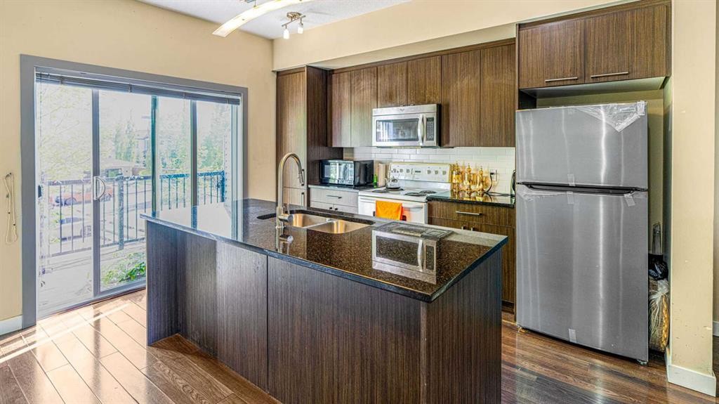 347 Taralake Way Ne, Calgary, AB - Indoor Photo Showing Kitchen With Double Sink