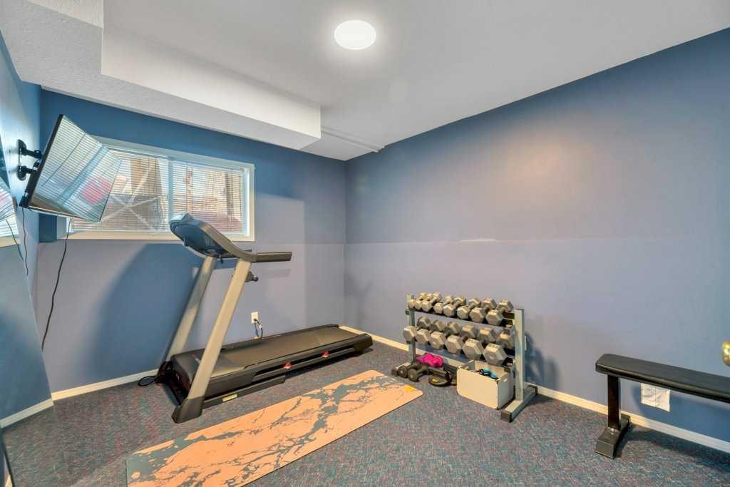 191 Strathaven Crescent, Strathmore, AB - Indoor Photo Showing Gym Room