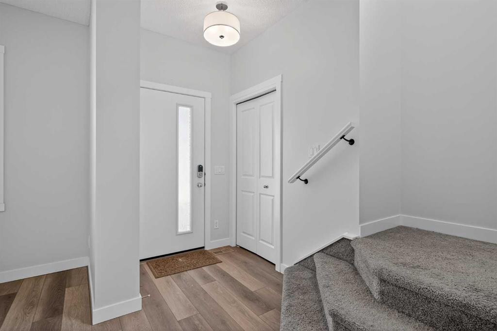 326 Creekside Boulevard Sw, Calgary, AB - Indoor Photo Showing Other Room