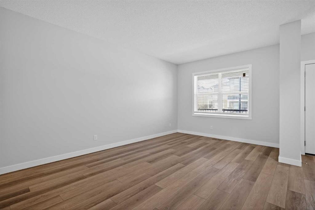 326 Creekside Boulevard Sw, Calgary, AB - Indoor Photo Showing Other Room