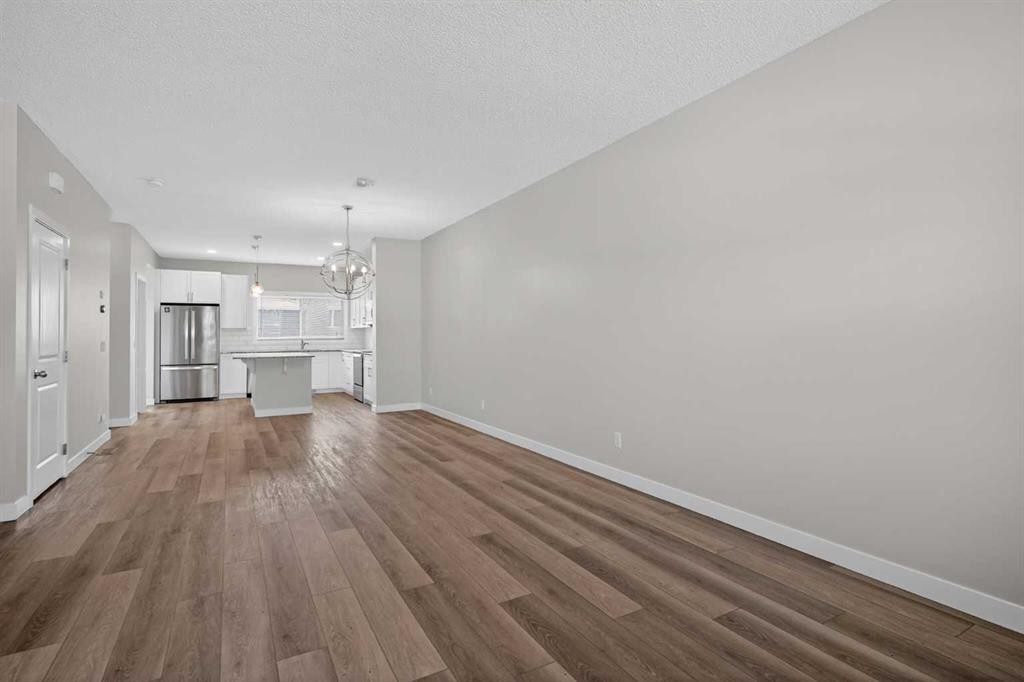 326 Creekside Boulevard Sw, Calgary, AB - Indoor Photo Showing Other Room