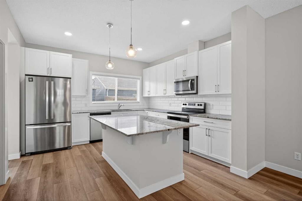 326 Creekside Boulevard Sw, Calgary, AB - Indoor Photo Showing Kitchen With Upgraded Kitchen