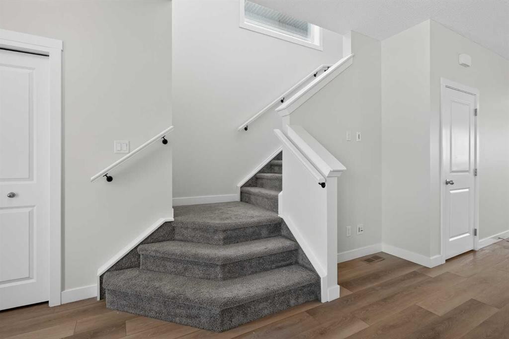 326 Creekside Boulevard Sw, Calgary, AB - Indoor Photo Showing Other Room