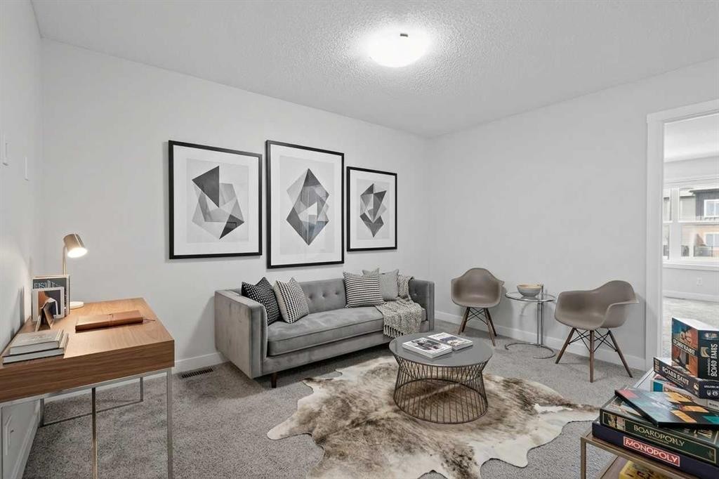 326 Creekside Boulevard Sw, Calgary, AB - Indoor Photo Showing Living Room
