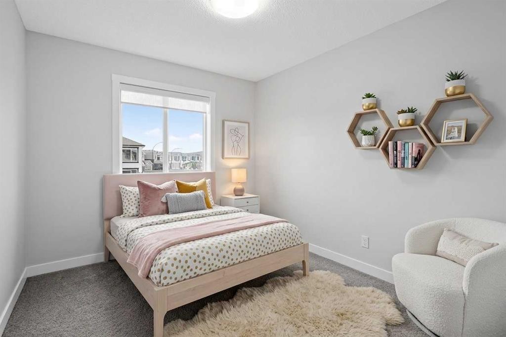326 Creekside Boulevard Sw, Calgary, AB - Indoor Photo Showing Bedroom