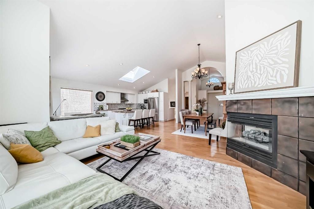 243 Mt Assiniboine Circle Se, Calgary, AB - Indoor Photo Showing Living Room With Fireplace