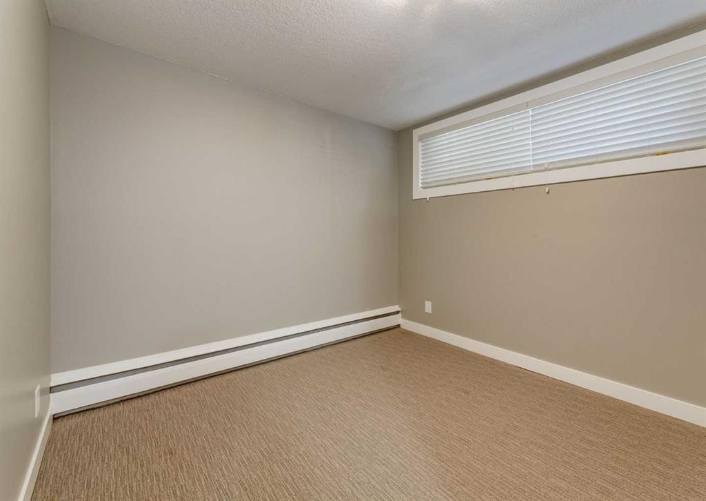 84 Fullerton Road Se, Calgary, AB - Indoor Photo Showing Other Room