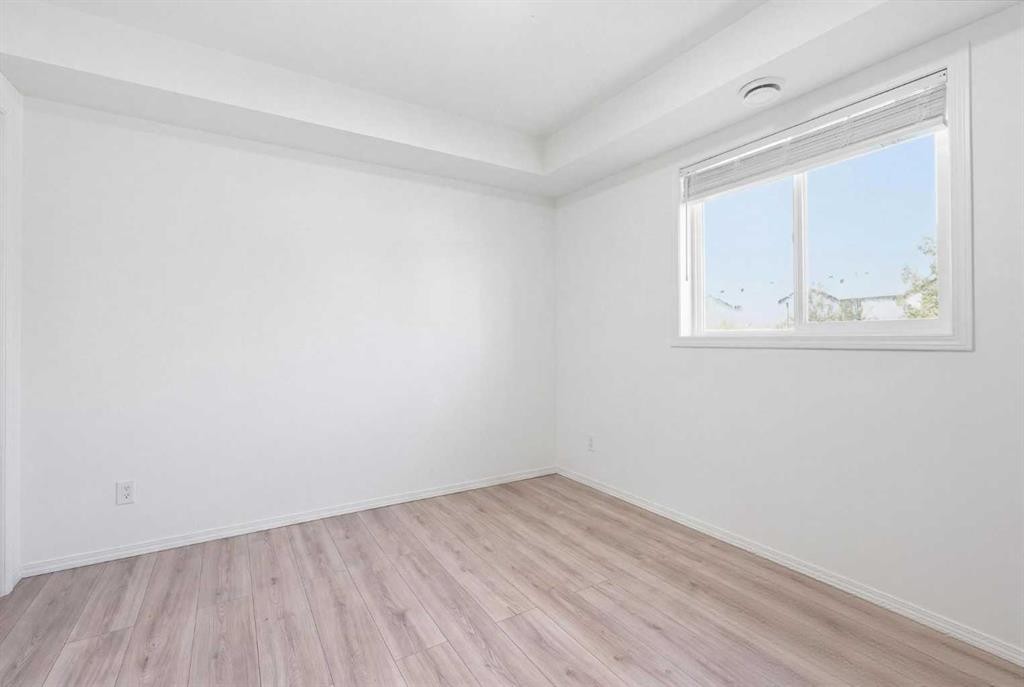 400-8 Bayside Place, Strathmore, AB - Indoor Photo Showing Other Room