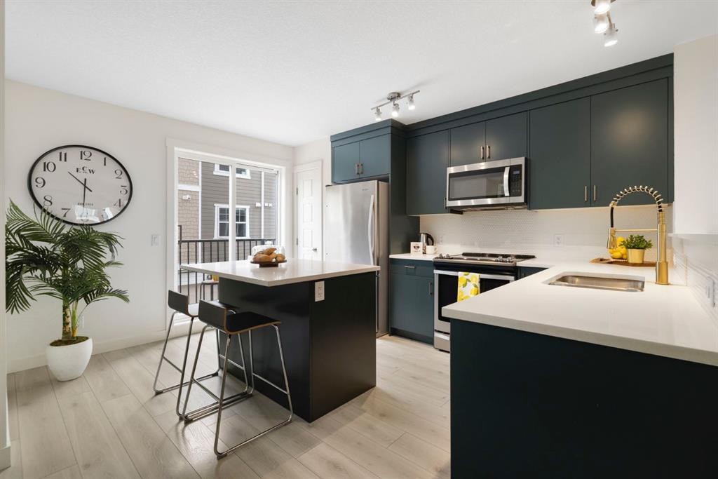 812 Cranbrook Walk Se, Calgary, AB - Indoor Photo Showing Kitchen With Stainless Steel Kitchen With Upgraded Kitchen