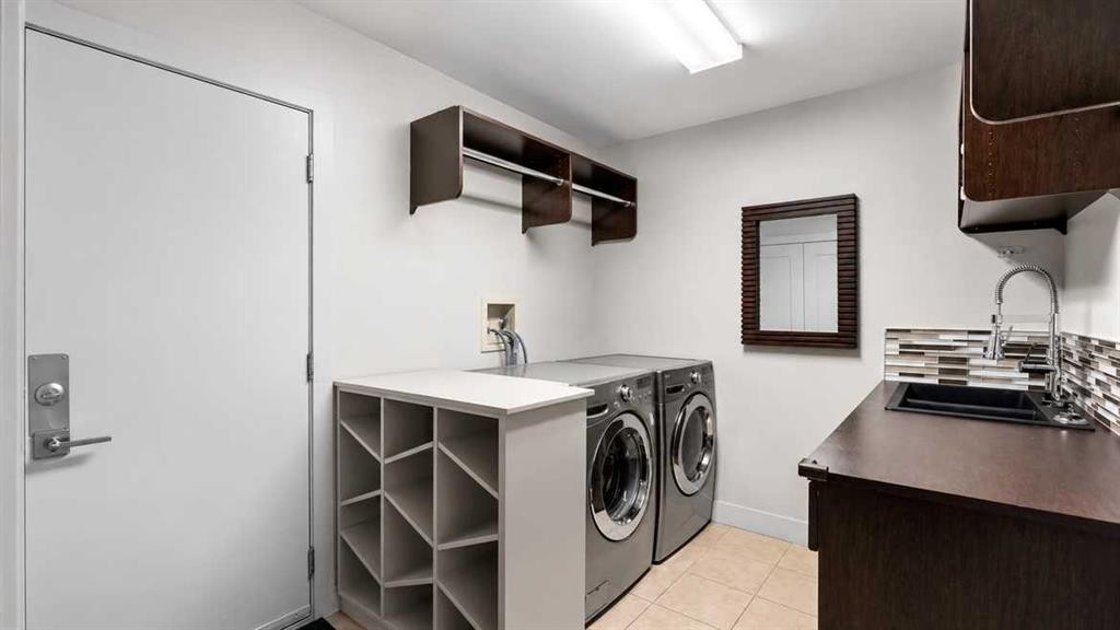 19 Coach Gate Way Sw, Calgary, AB - Indoor Photo Showing Laundry Room