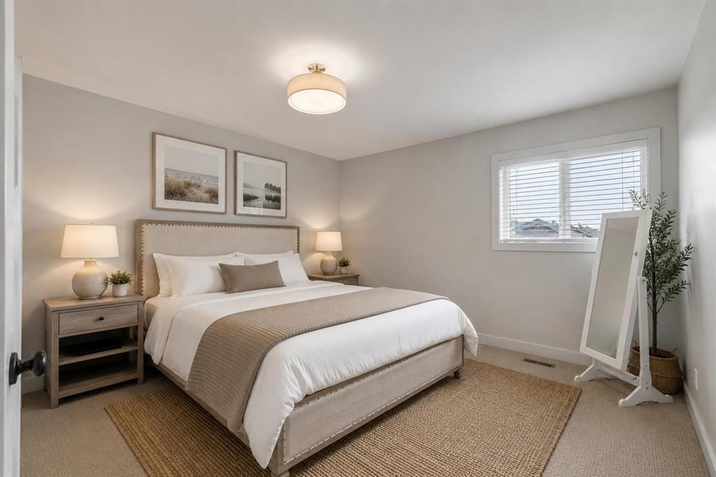 19 Coach Gate Way Sw, Calgary, AB - Indoor Photo Showing Bedroom