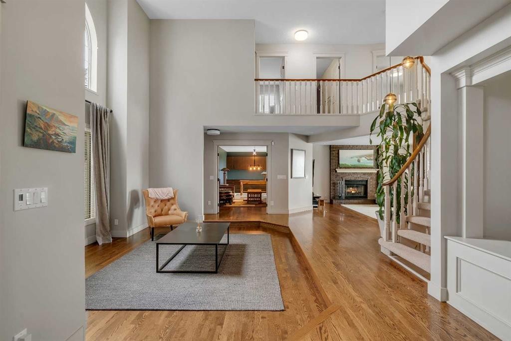19 Coach Gate Way Sw, Calgary, AB - Indoor With Fireplace
