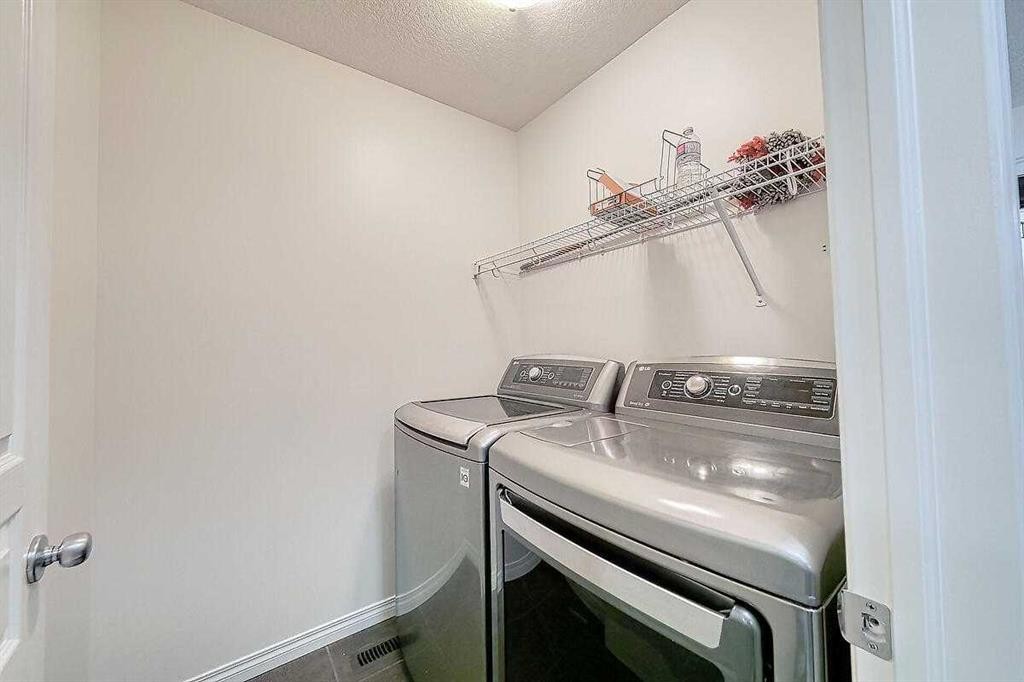 106 Sage Meadows Way Nw, Calgary, AB - Indoor Photo Showing Laundry Room