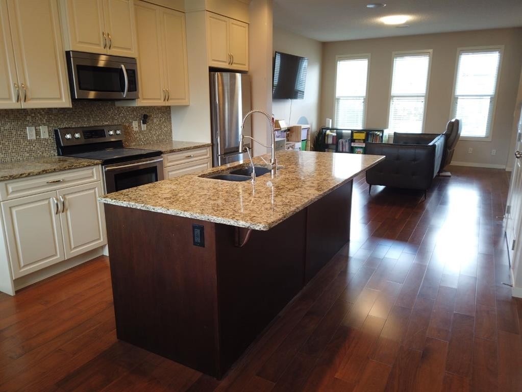 2064 New Brighton Grove Se, Calgary, AB - Indoor Photo Showing Kitchen With Double Sink