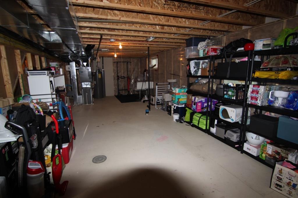 2064 New Brighton Grove Se, Calgary, AB - Indoor Photo Showing Basement