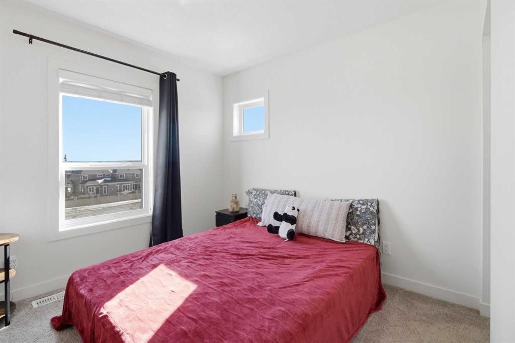 402-11 Evanscrest Mews Nw, Calgary, AB - Indoor Photo Showing Bedroom