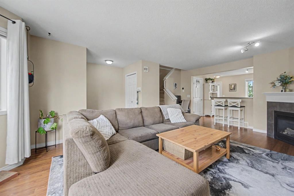 65 Royal Birch Villas Nw, Calgary, AB - Indoor Photo Showing Living Room With Fireplace