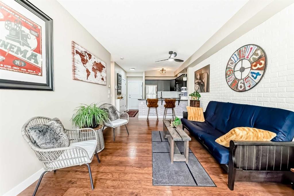 2105-211 Aspen Stone Boulevard Sw, Calgary, AB - Indoor Photo Showing Living Room