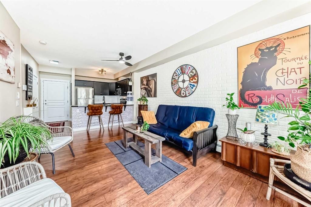 2105-211 Aspen Stone Boulevard Sw, Calgary, AB - Indoor Photo Showing Living Room