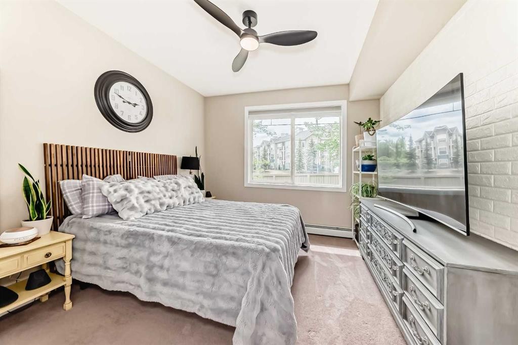 2105-211 Aspen Stone Boulevard Sw, Calgary, AB - Indoor Photo Showing Bedroom