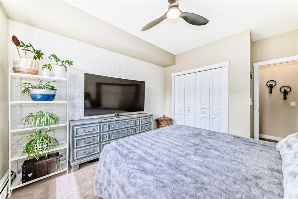 2105-211 Aspen Stone Boulevard Sw, Calgary, AB - Indoor Photo Showing Bedroom