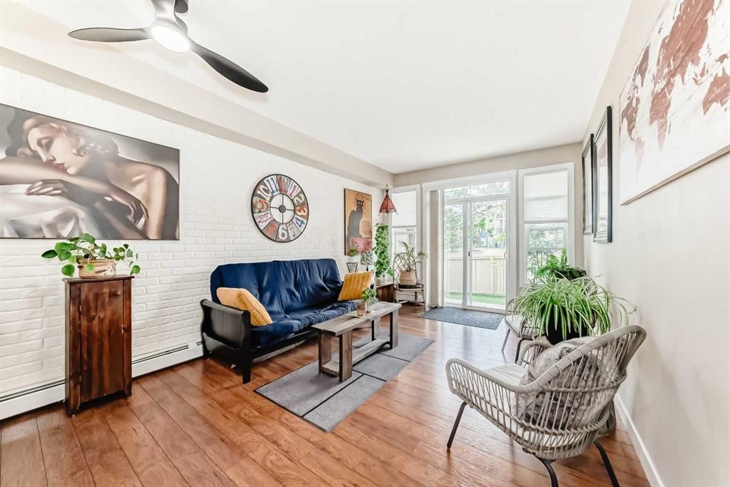 2105-211 Aspen Stone Boulevard Sw, Calgary, AB - Indoor Photo Showing Living Room