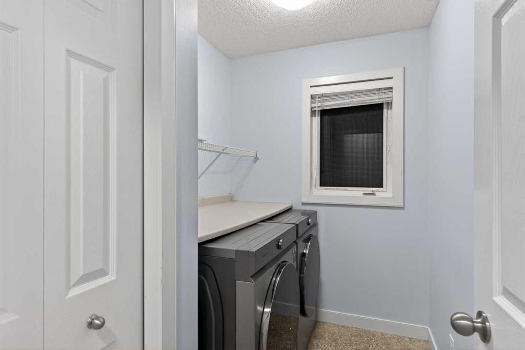 9 Westridge Way, Okotoks, AB - Indoor Photo Showing Laundry Room