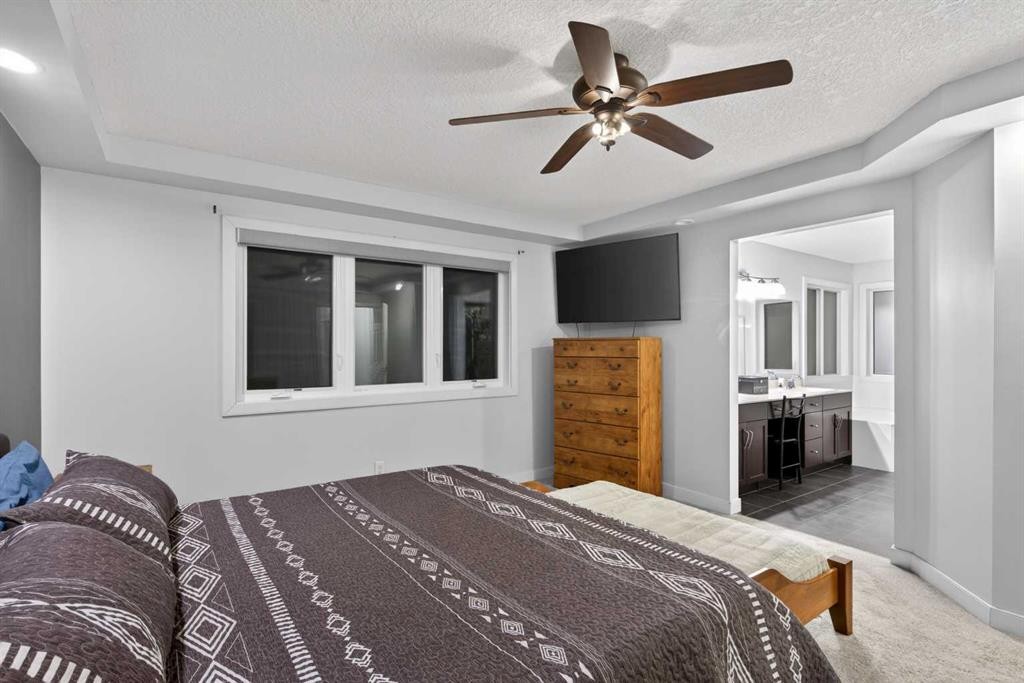 9 Westridge Way, Okotoks, AB - Indoor Photo Showing Bedroom