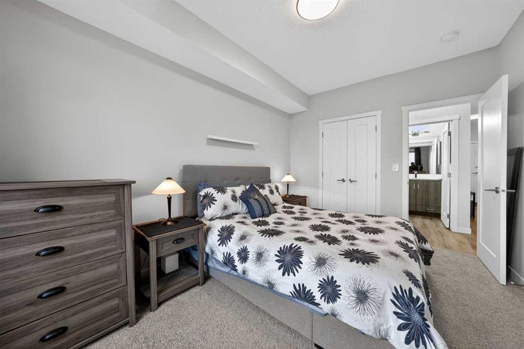 403-71 Shawnee Common Sw, Calgary, AB - Indoor Photo Showing Bedroom