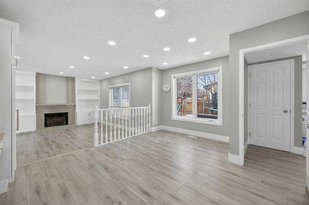 55 Millrise Way Sw, Calgary, AB - Indoor With Fireplace