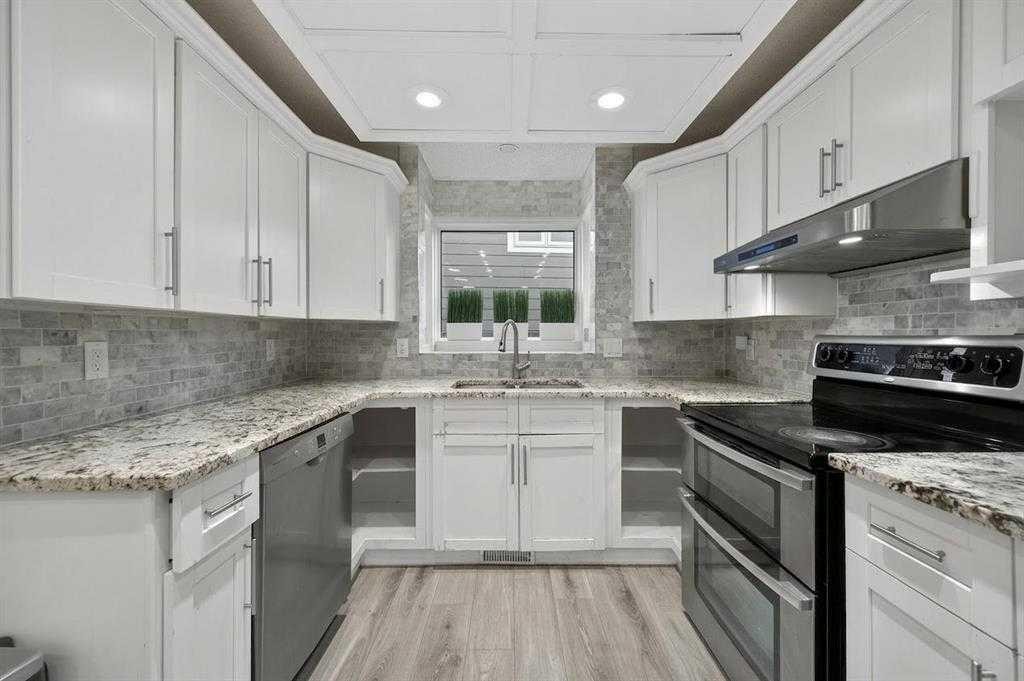 55 Millrise Way Sw, Calgary, AB - Indoor Photo Showing Kitchen With Stainless Steel Kitchen With Upgraded Kitchen