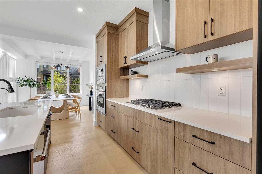 24 Alpine Common Sw, Calgary, AB - Indoor Photo Showing Kitchen With Upgraded Kitchen