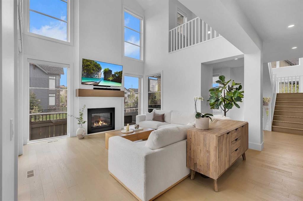 24 Alpine Common Sw, Calgary, AB - Indoor Photo Showing Living Room With Fireplace